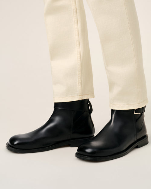 Black buckle cow leather boots - 2 - Ami Paris